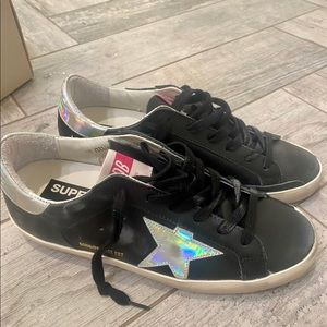Authentic Golden Goose Star 38, which is an size 8. Bought & they are too small